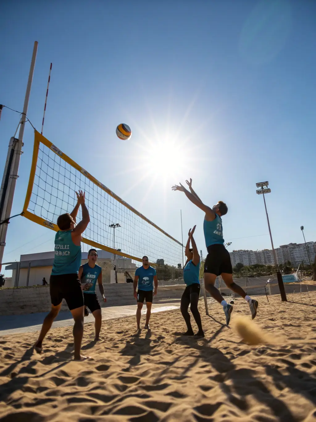 An image of children and adults playing volleyball on a sunny outdoor court, highlighting the fun and inclusive nature of FITS N FORME's sports programs.